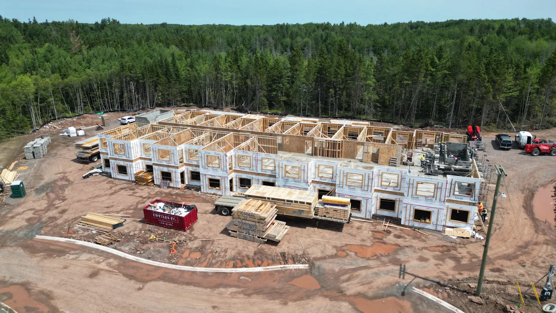 Wood framing going up on one of the apartment buildings